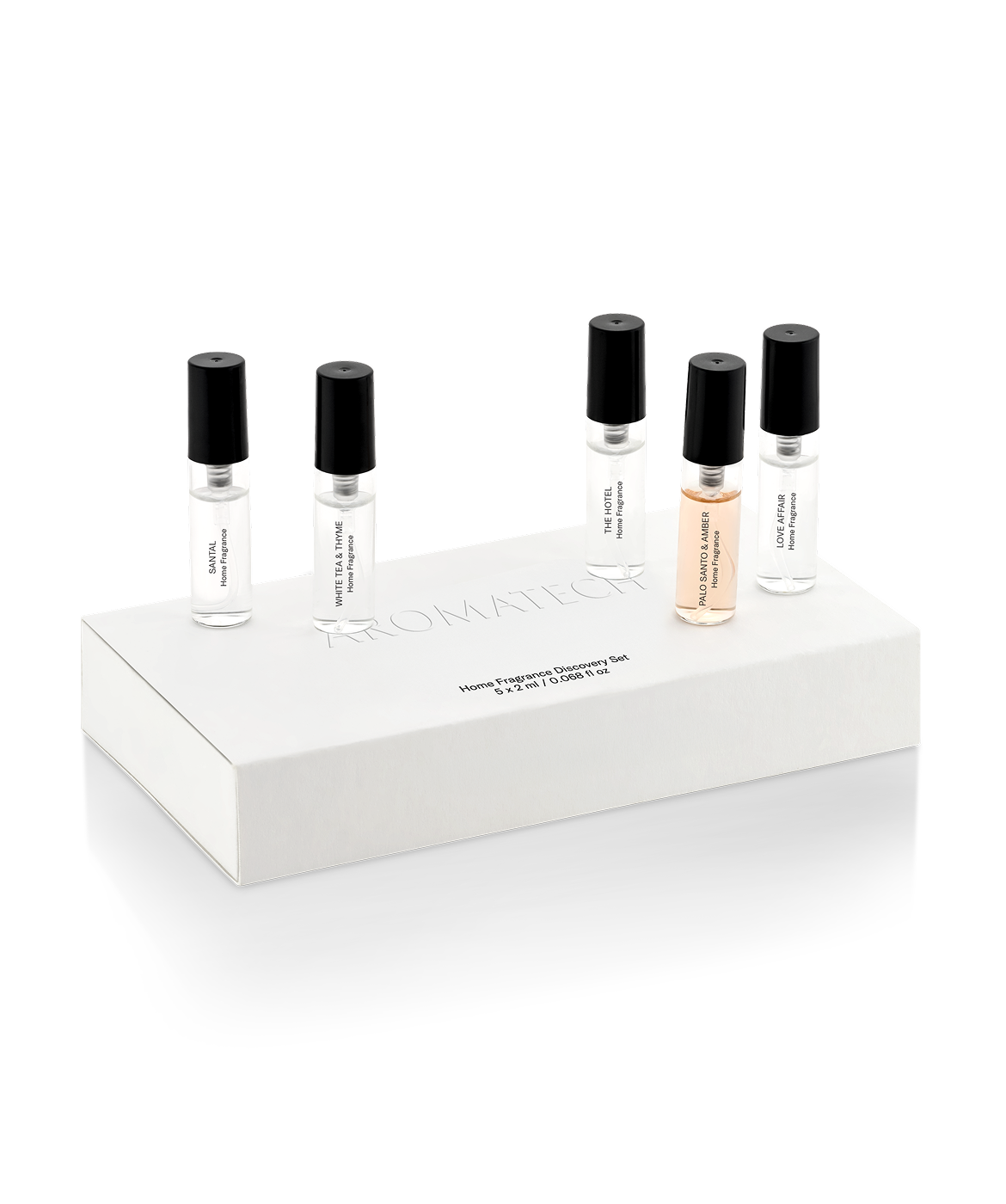 Set of five small perfume bottles with black caps on a white display stand.
