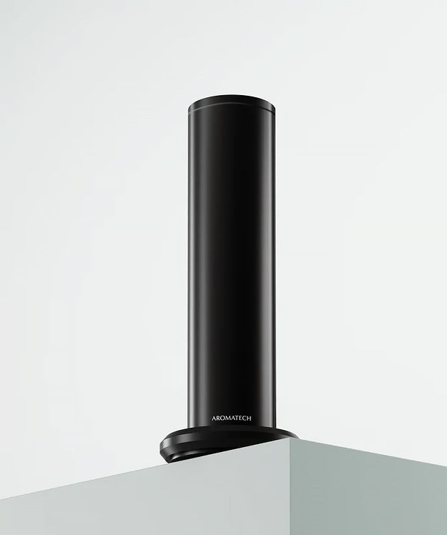 Luxury scent diffuser by Aromatech on a modern table